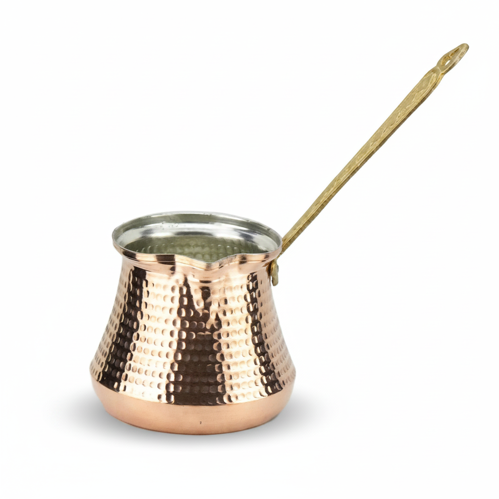 Hammered copper milk pot sutluk white background
